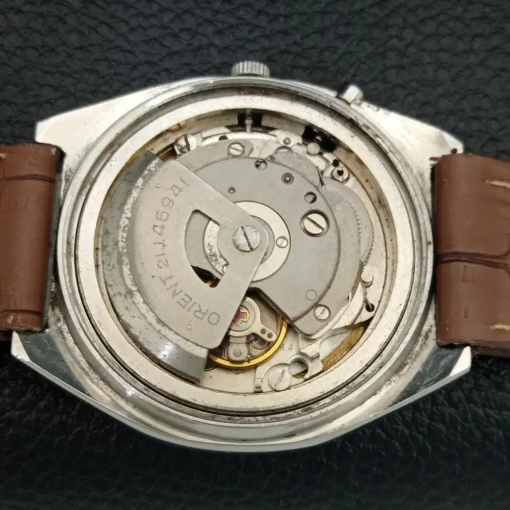 Vintage 1983 Orient Automatic Mens Silver Watch W/daydate & Gold accents